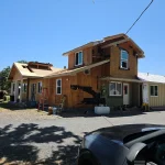 Residential home in santa rosa getting new metal siding with a new roof replacement